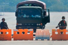 Tanks on Myanmar streets as Aung San Suu Kyi detained - follow live