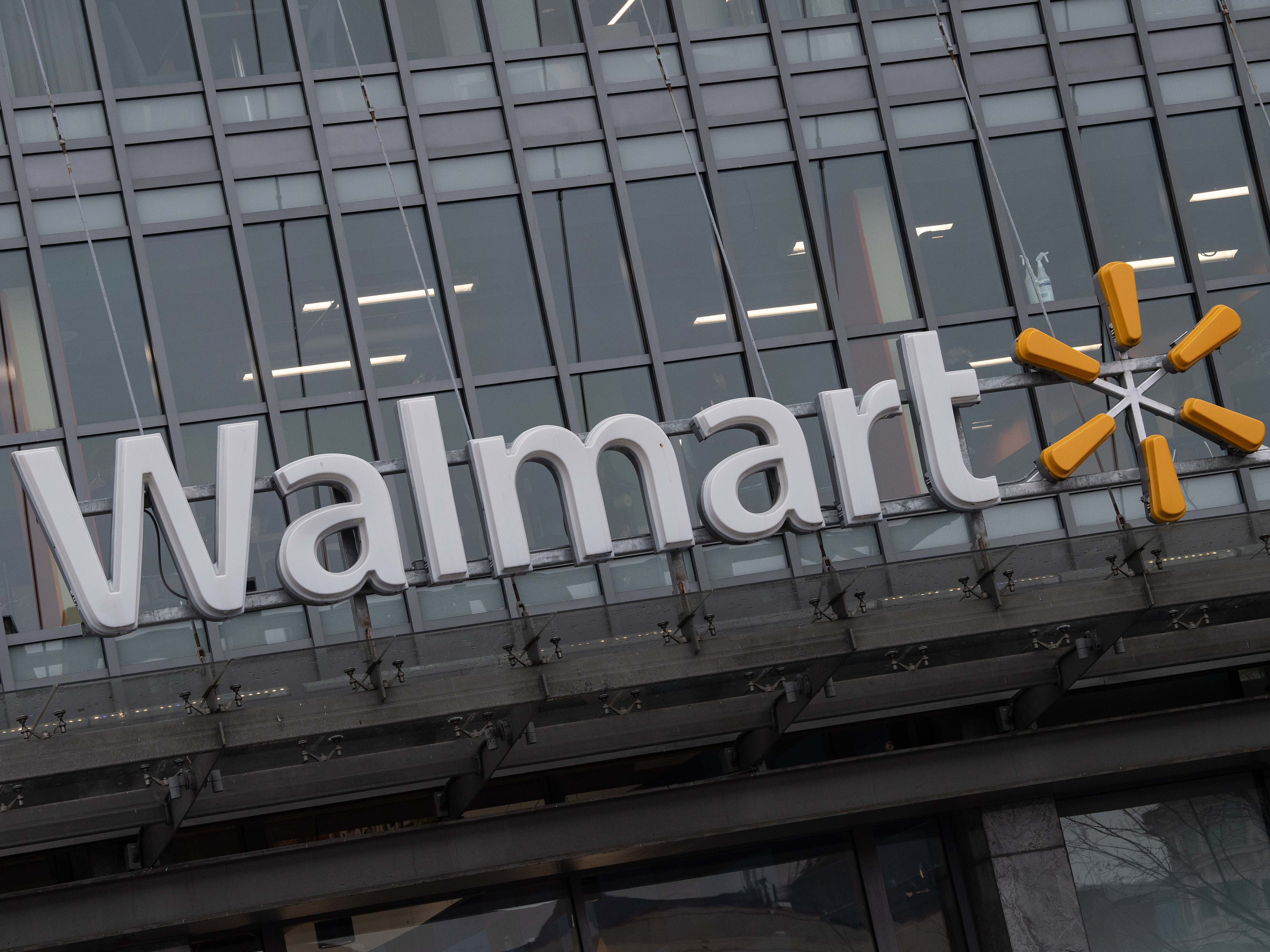 The Walmart logo is seen on a store in Washington, DC, on 1 March 2019