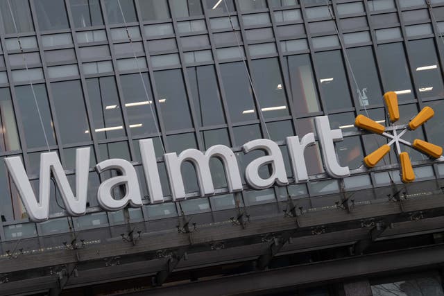 <p>The Walmart logo is seen on a store in Washington, DC, on 1 March 2019</p>