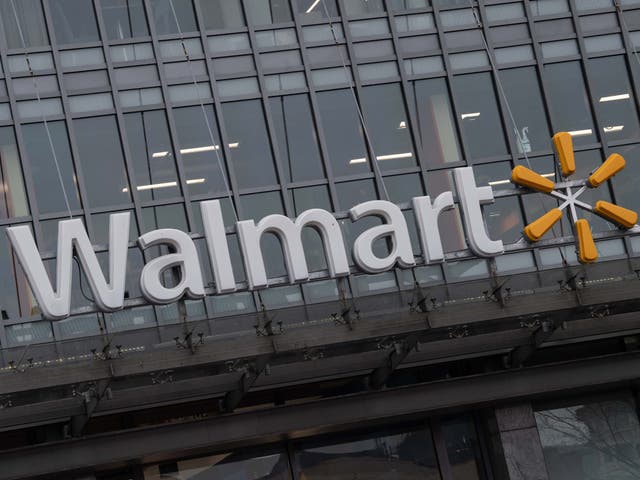 <p>The Walmart logo is seen on a store in Washington, DC, on 1 March 2019</p>