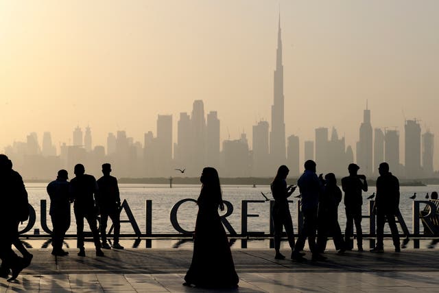 <p>Locals and tourists enjoy the Dubai skyline including the world tallest tower, Burj Khalifa</p>