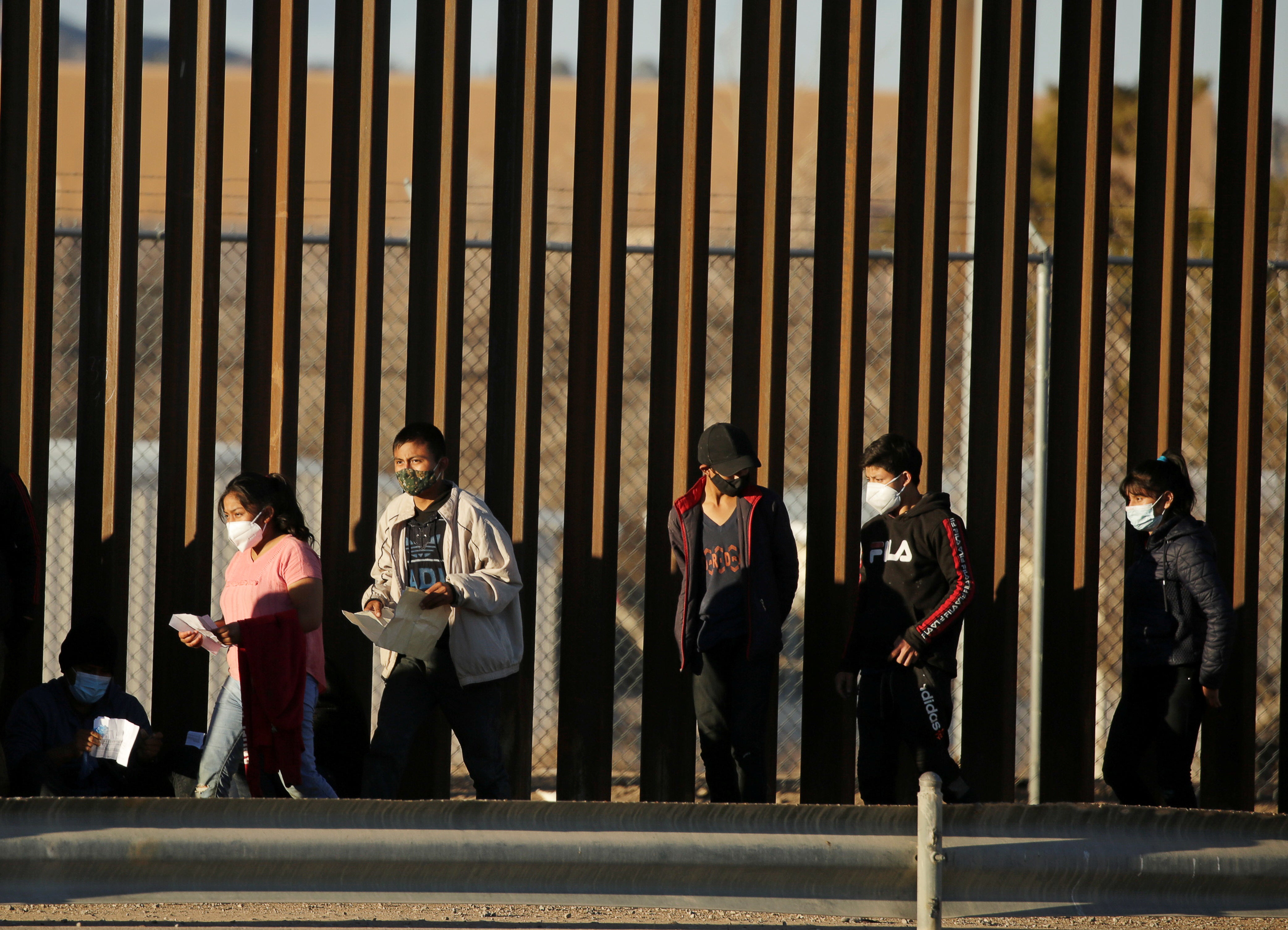 People seeking asylum cross into El Paso, Texas from Ciudad Juarez, Mexico on 22 January. President Joe Biden has sought to undo a core of Donald Trump’s immigration agenda.