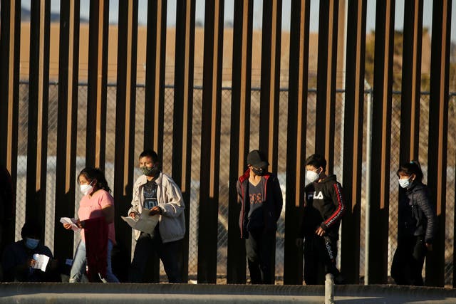 People seeking asylum cross into El Paso, Texas from Ciudad Juarez, Mexico on 22 January. President Joe Biden has sought to undo a core of Donald Trump’s immigration agenda.