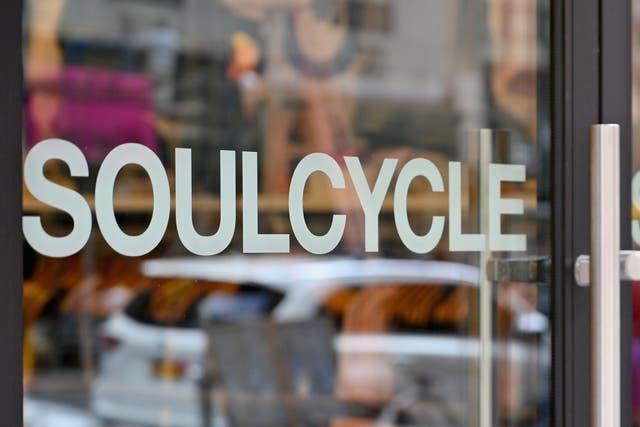 <p>Signage of a SoulCycle fitness studio is seen in Brooklyn, New York on 9 August 2019</p>
