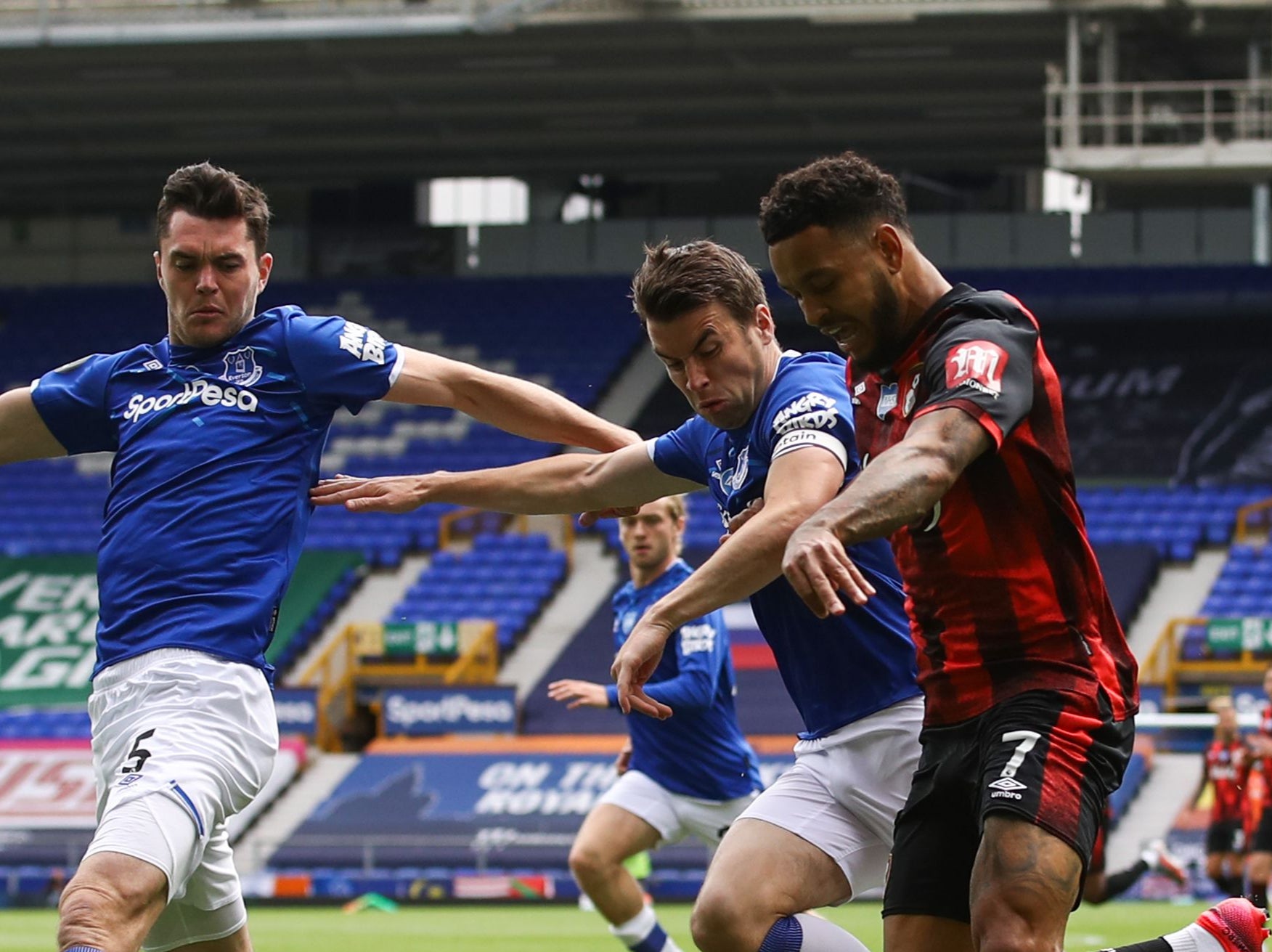 Josh King (right) in action against Everton, his new club