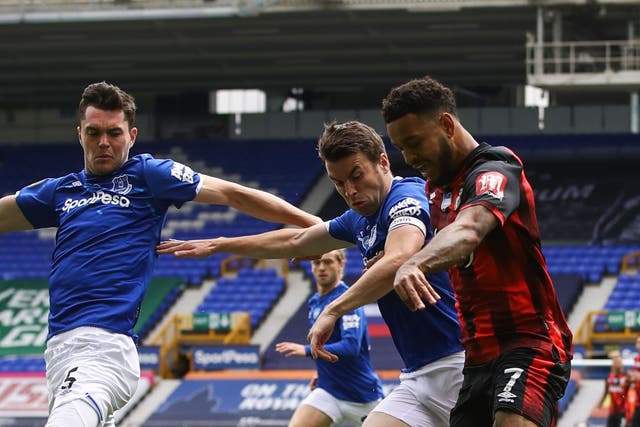Josh King (right) in action against Everton, his new club