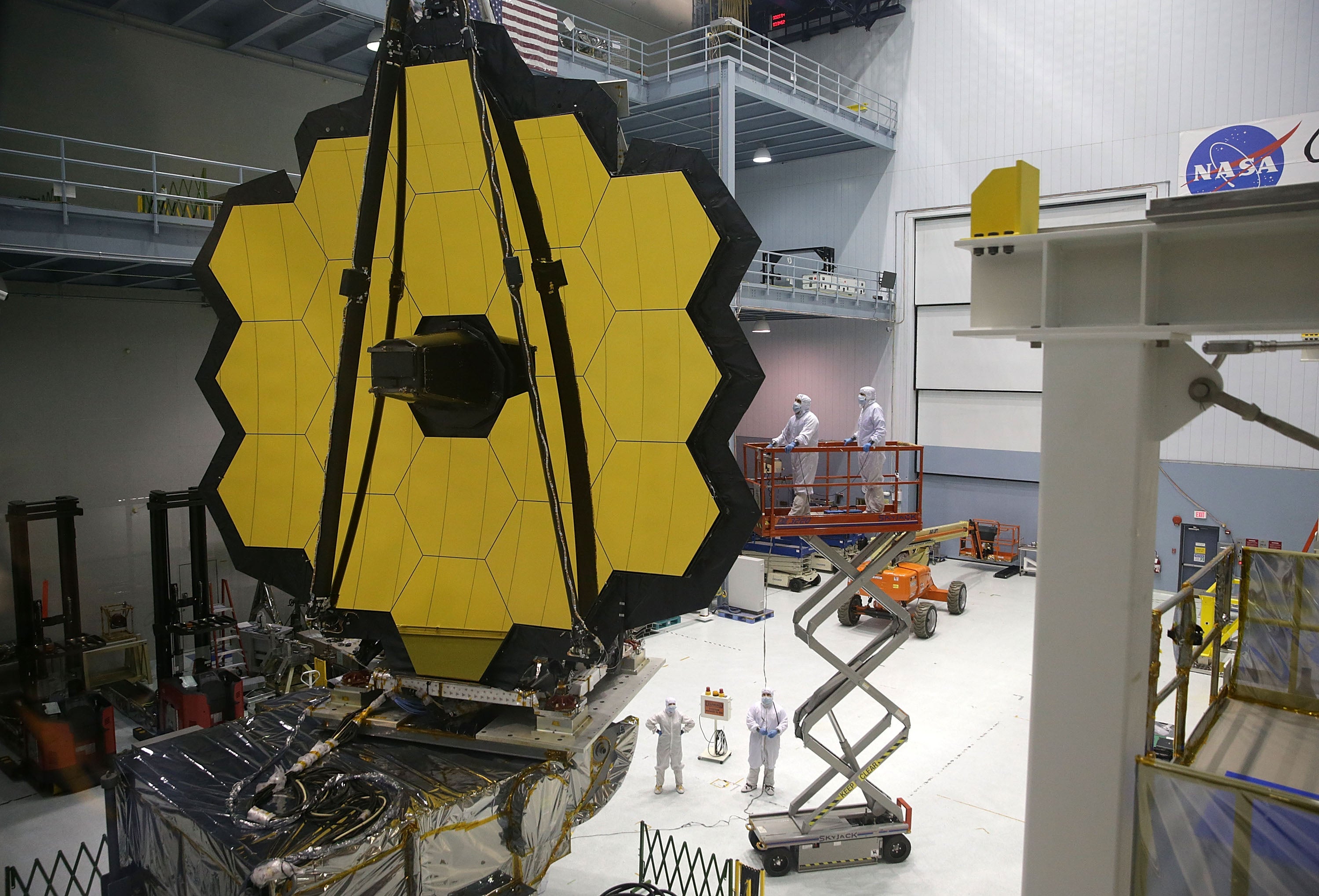 Engineers and technicians assemble the James Webb Space Telescope at Nasa's Goddard Space Flight Centre in Maryland