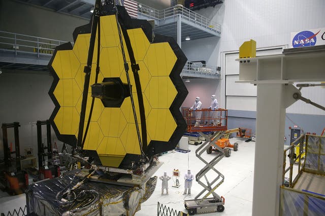 <p>Engineers and technicians assemble the James Webb Space Telescope at Nasa's Goddard Space Flight Centre in Maryland</p>