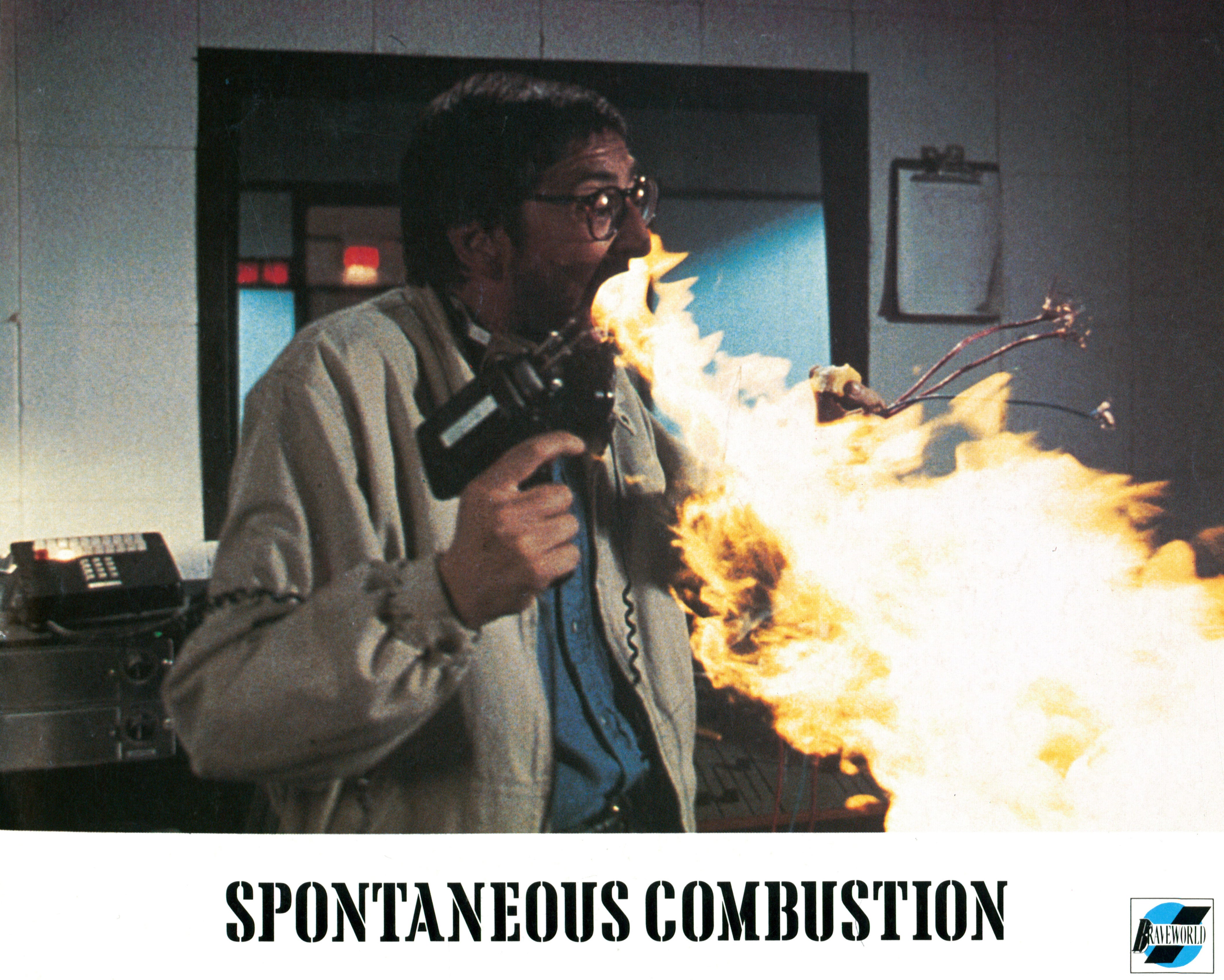A man breathes fire in a scene from the film ‘Spontaneous Combustion’, 1990