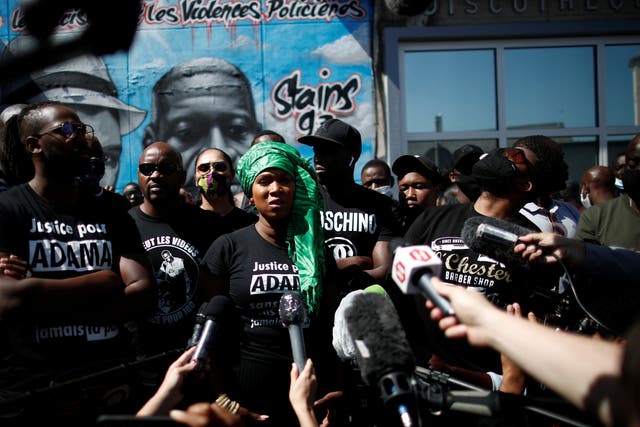 <p>Journalists listen to Assa Traore, sister of Adama Traore, a 24-year-old Black Frenchman who died in a 2016 police operation.</p>