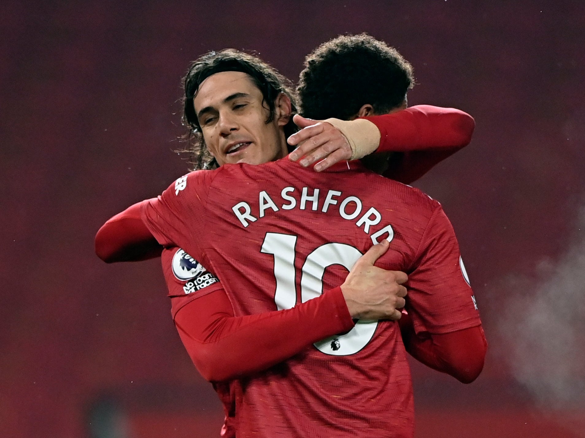 Edinson Cavani and Marcus Rashford celebrate victory