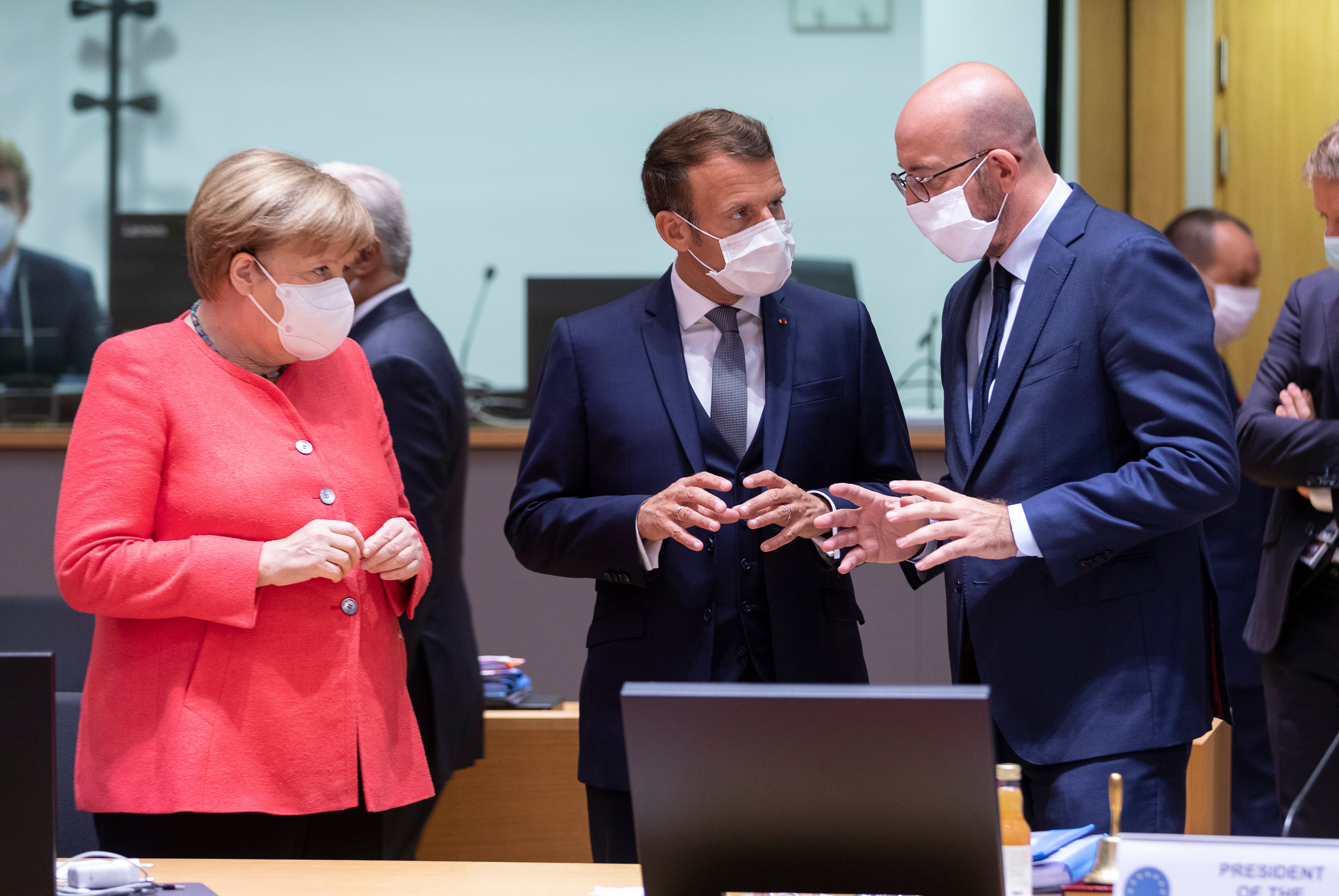 German chancellor Angela Merkel talks with French president Emmanuel Macron (centre) and Charles Michel, president of European Council during an EU summit in Brussels in July 2020