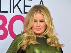 Jennifer Coolidge posed as a twin so she could date two men at once