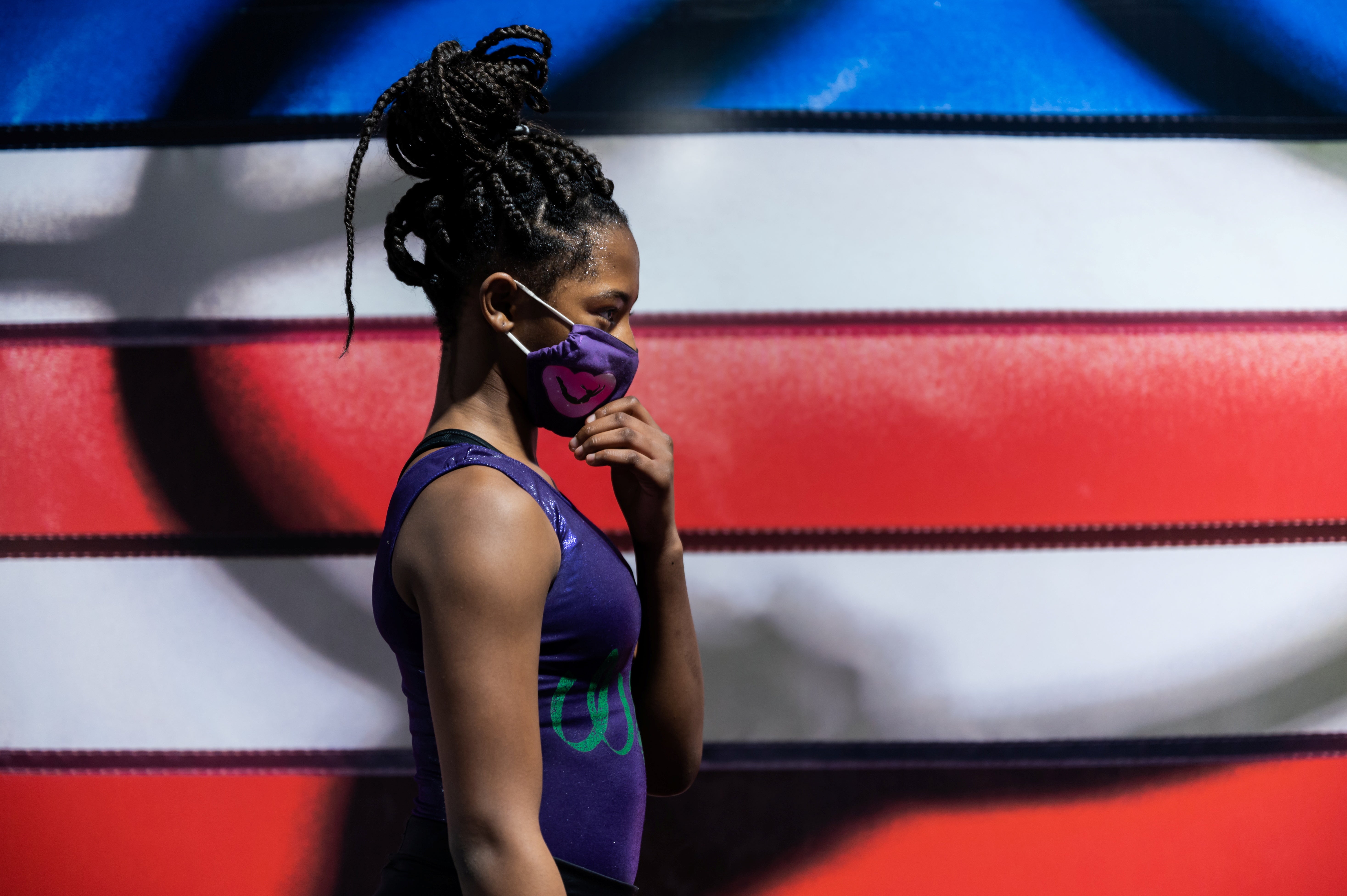 Ty-La Morris wears a protective face mask as she trains