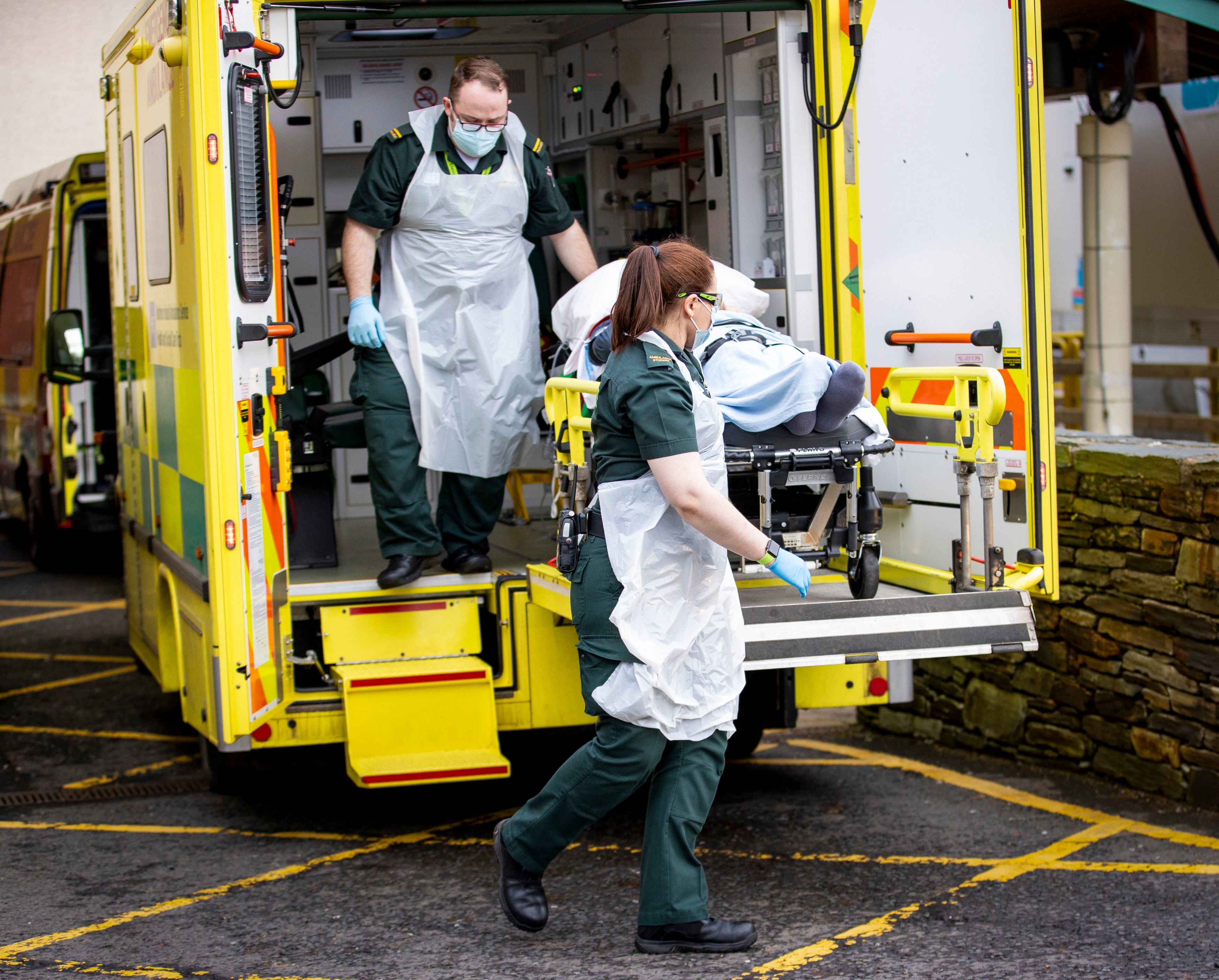 Paramedic Daniel McCollam and student EMT Ruth Corscadden arrive with a patient at Causeway Hospital