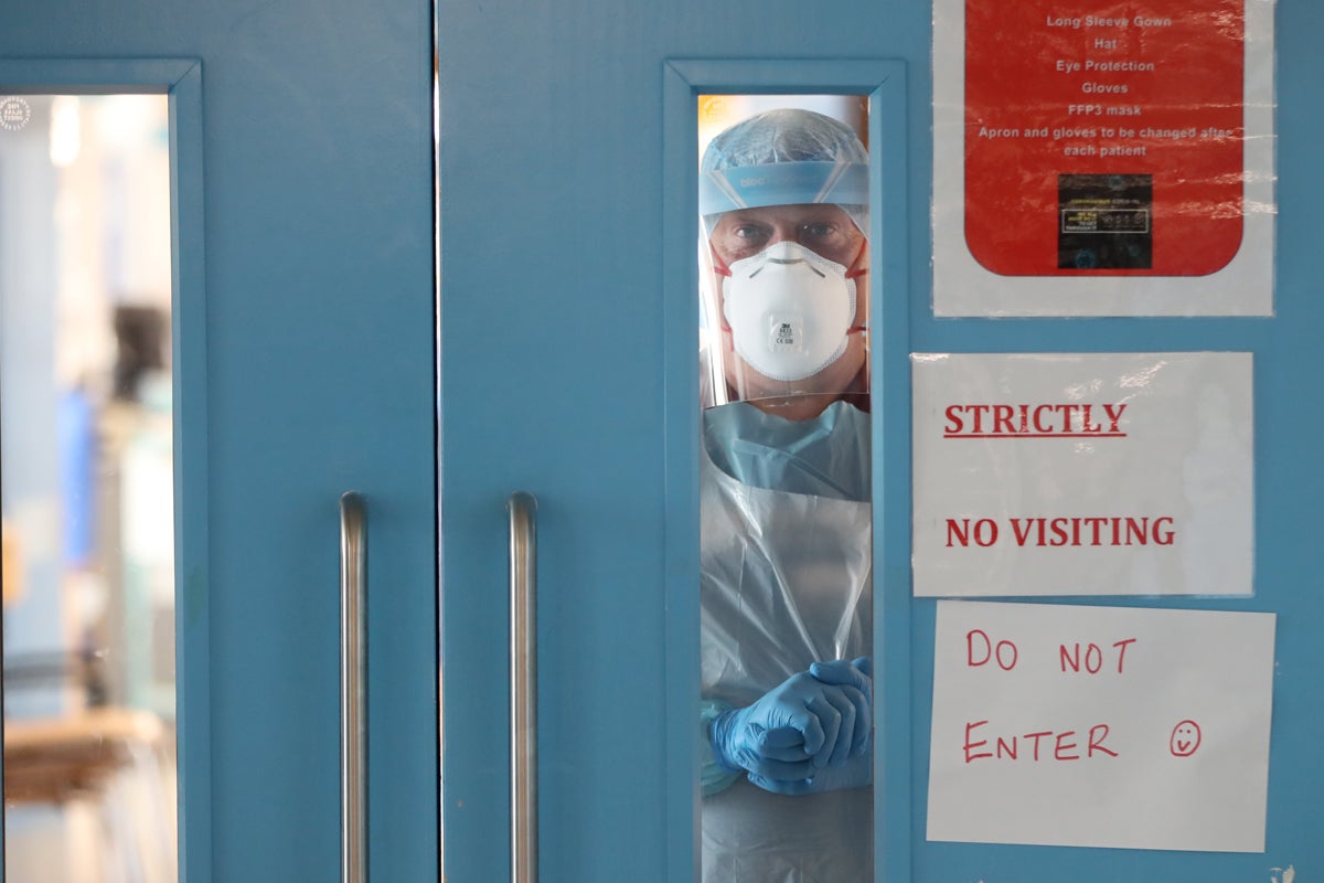 Infection control nurse Colin Clarke looks out from a Covid-19 recovery ward at Craigavon Area Hospital in Co Armagh