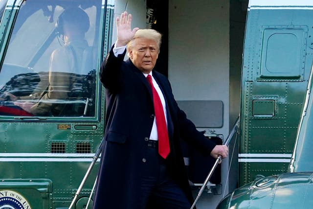 Donald Trump waves as he boards Marine One on the South Lawn of the White House, in Washington, DC,