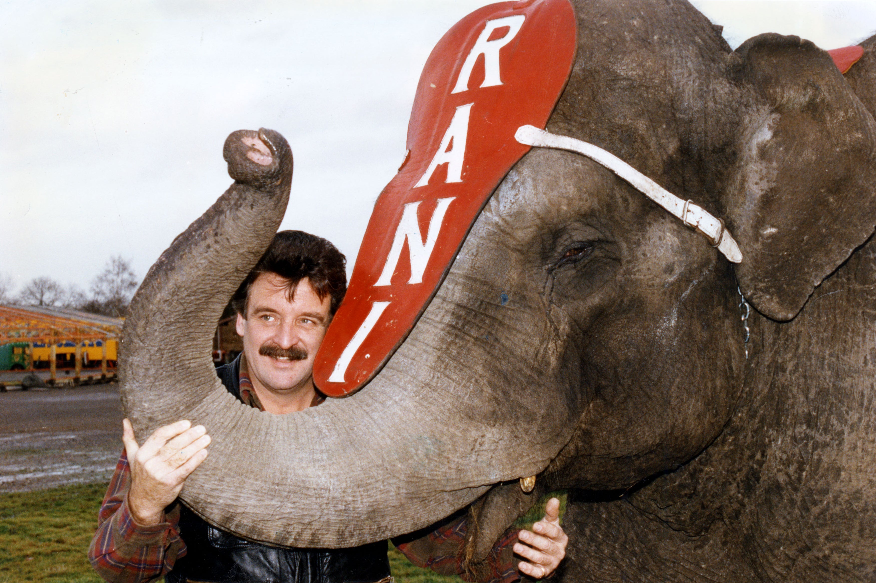With an elephant at his home in Addlestone Moor in 1992