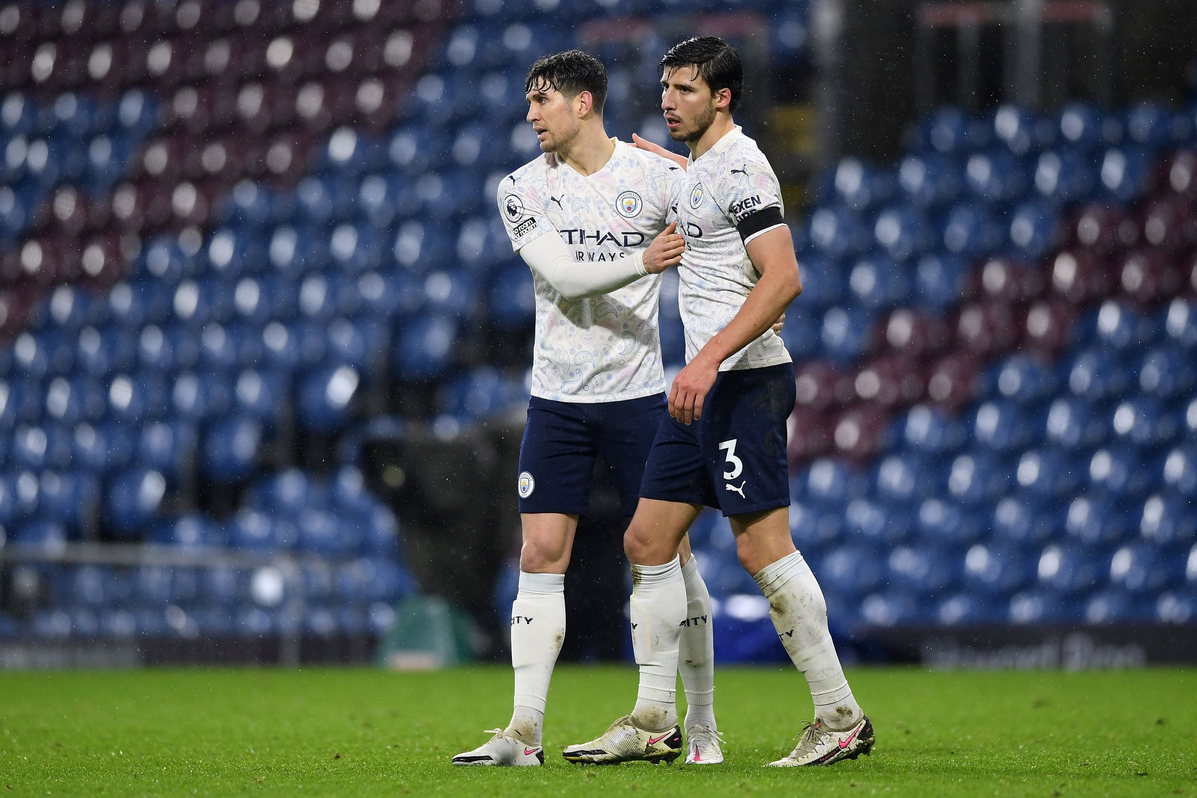 Ruben Dias (right) has been an inspired signing in central defence alongside a rejuvenated John Stones