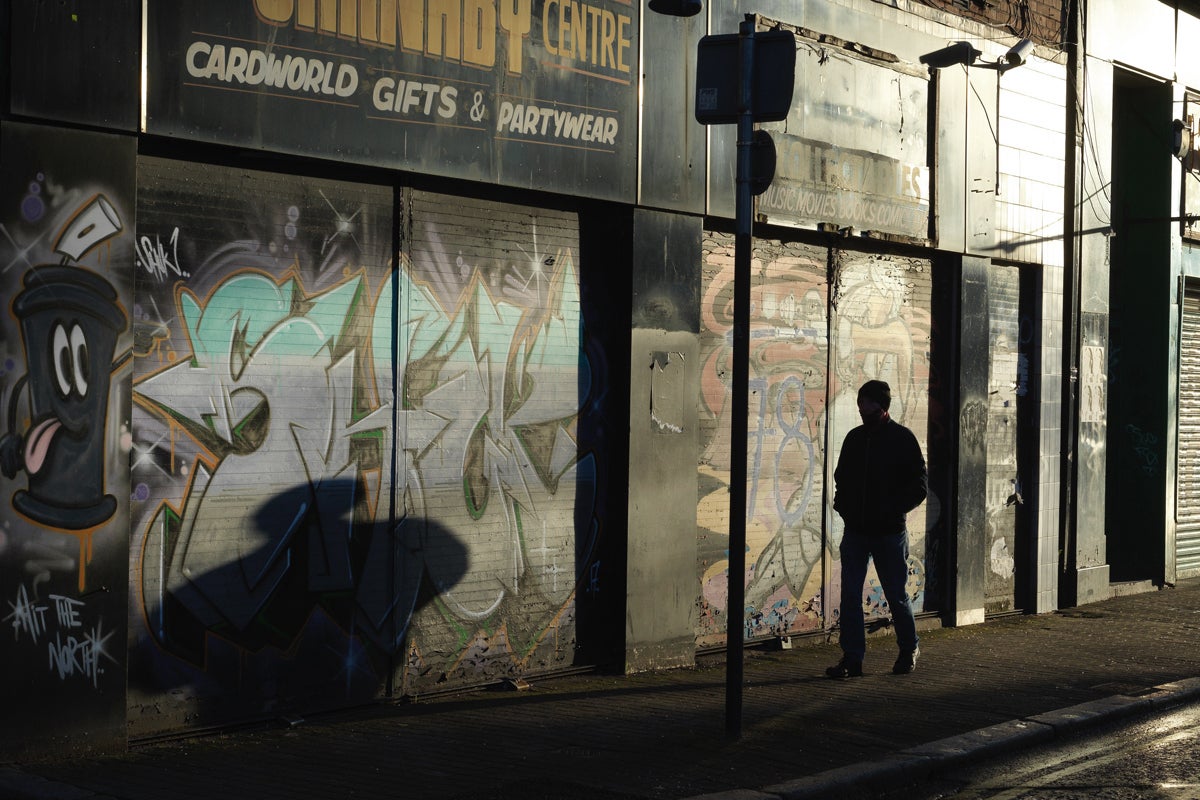 A man walks alone in Belfast city centre