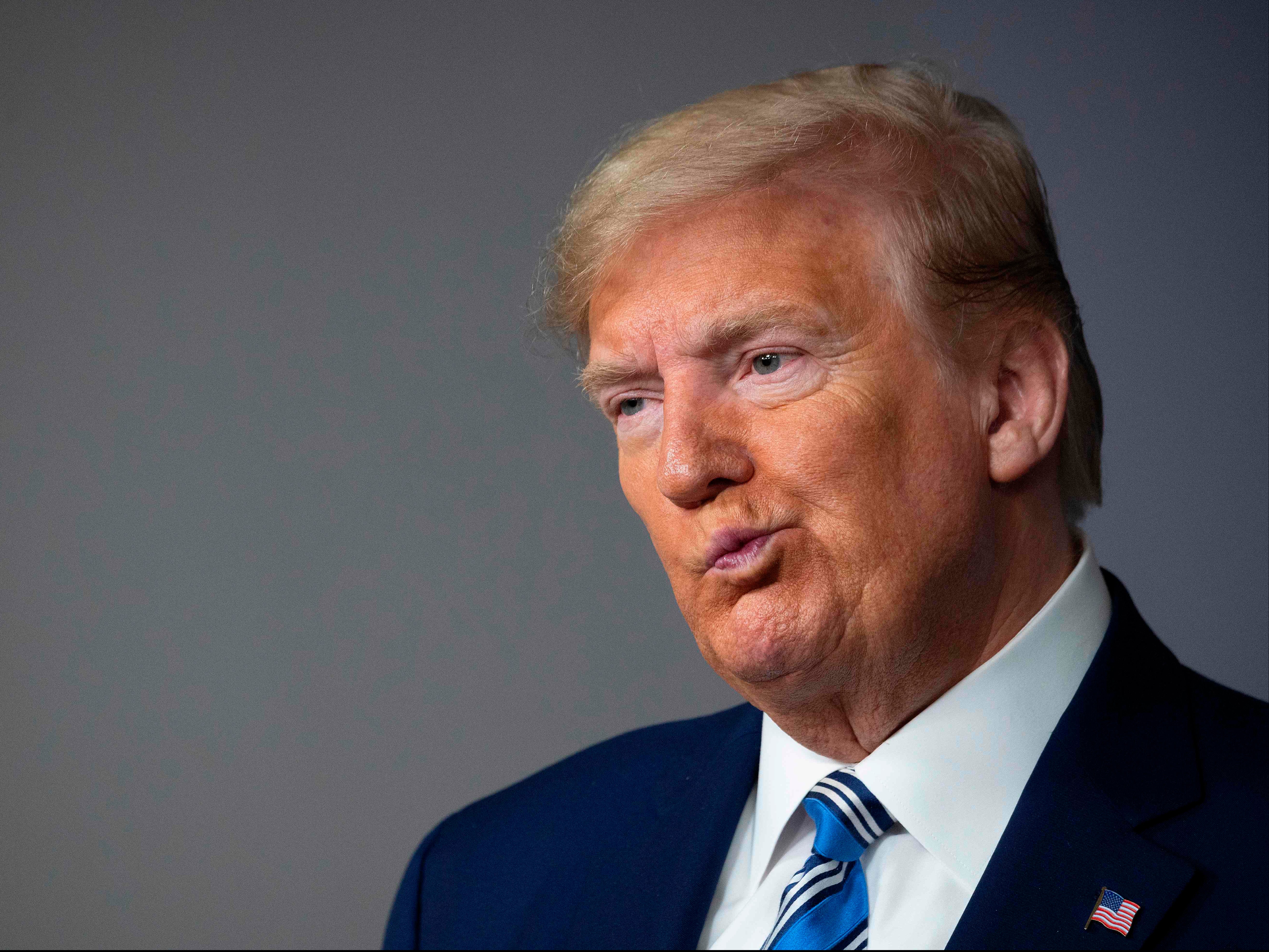 <p>Former president Donald Trump reacts during a Coronavirus Task Force press briefing at the White House in Washington on 19 April, 2020</p>