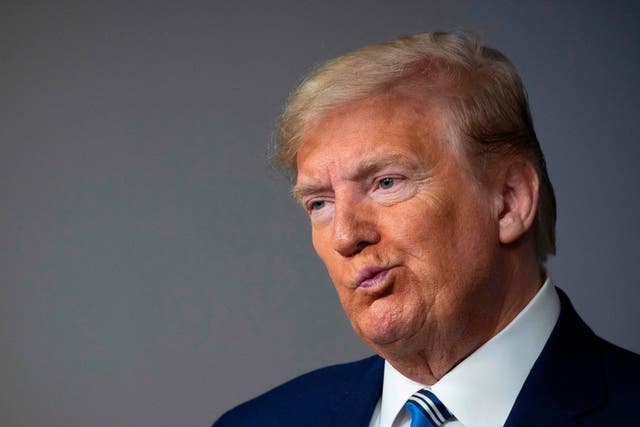 <p>Former president Donald Trump reacts during a Coronavirus Task Force press briefing at the White House in Washington on 19 April, 2020</p>