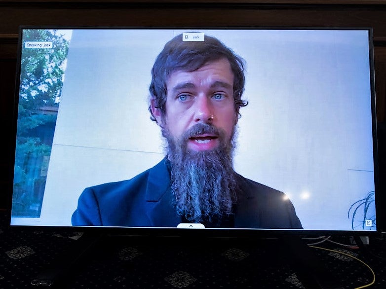 CEO of Twitter Jack Dorsey appears on a monitor as he testifies remotely during a Senate hearing on Capitol Hill, 28 October, 2020 in Washington, DC