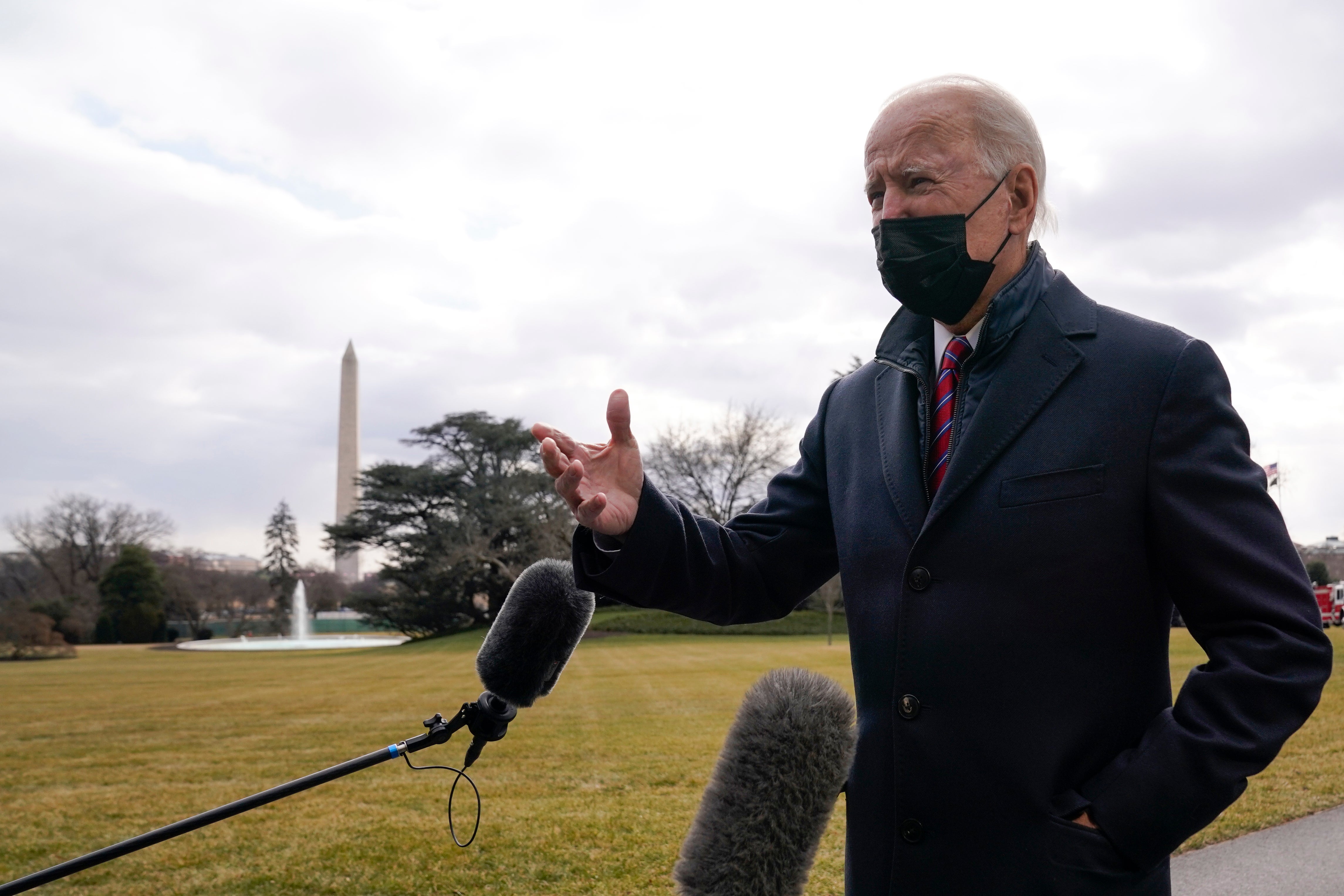 Joe Biden pictured departing the White House to fly on Marine One on a visit to Walter Reed National Military Medical Centre.