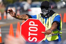 Los Angeles limits new vaccinations amid tight supplies 