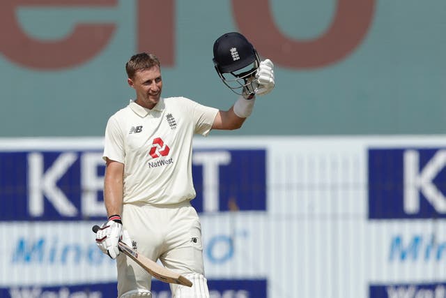 <p>Joe Root celebrates scoring a century</p>