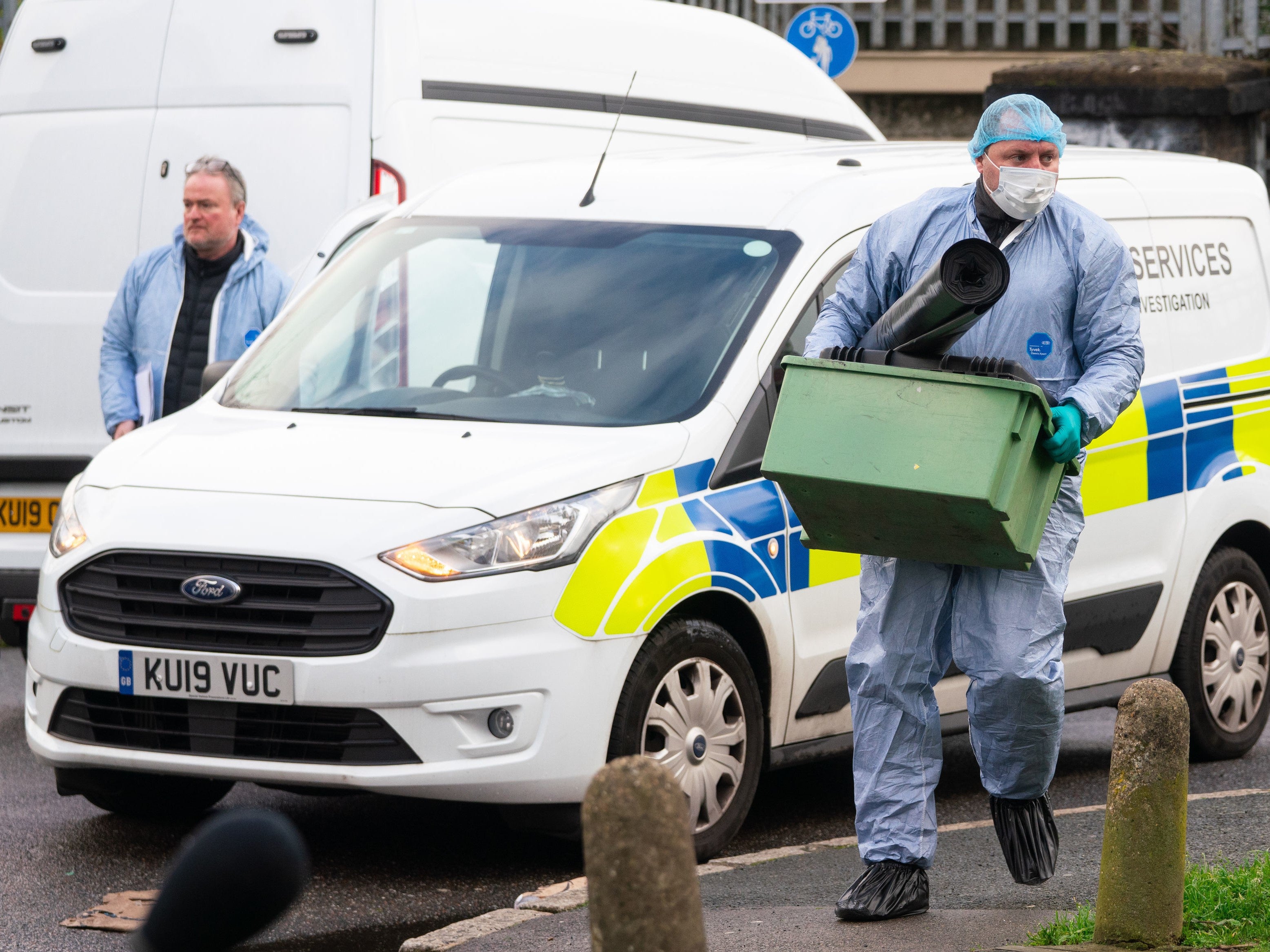 Police forensics officers at the scene of a fatal stabbing at flats on Wisbeach Road, in Croydon, London.