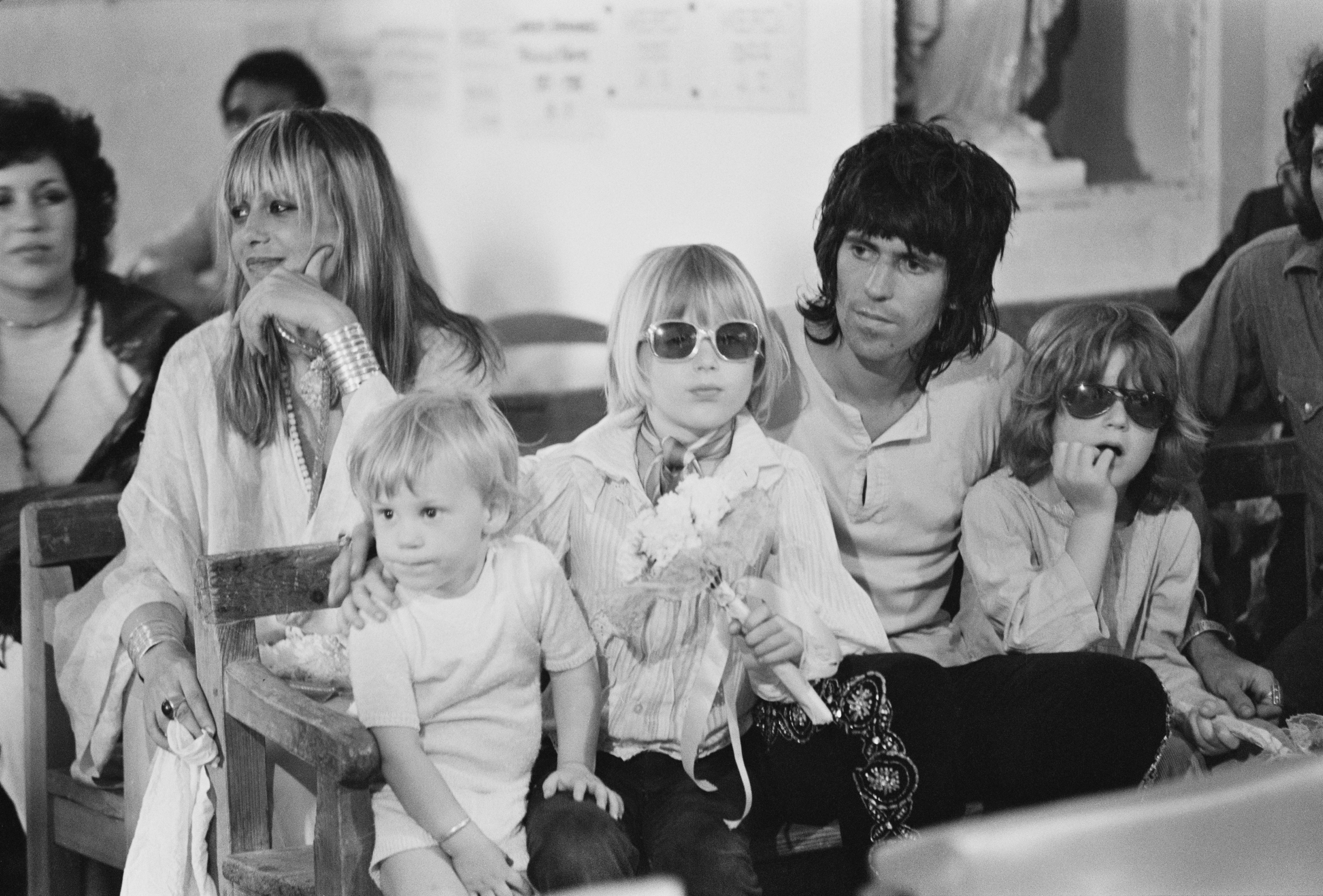 May: Keith Richards with his partner Anita Pallenberg and children at the wedding of Mick Jagger and Nicaraguan-born Bianca De Macias in Saint-Tropez, France