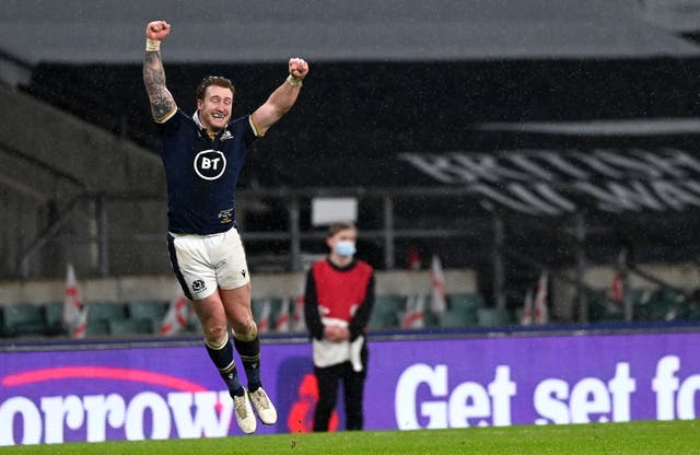 Scotland captain Stuart Hogg celebrates winning the Calcutta Cup by defeating England at Twickenham