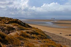 Two arrested and 64 fined at illegal beach rave on National Trust site