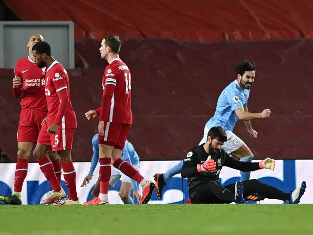 Alisson (second right) gifted Man City an unassailable lead at Anfield