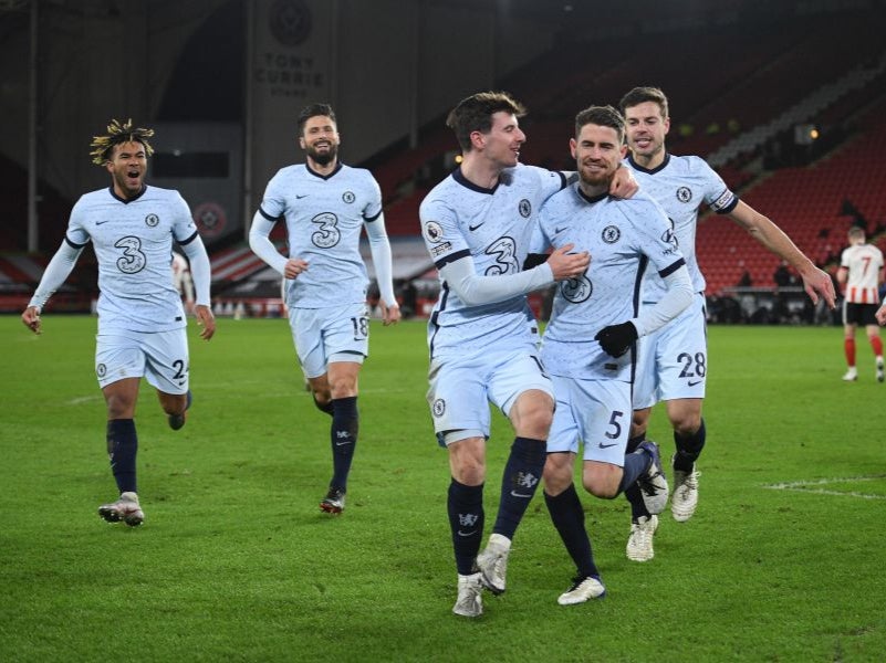 Chelsea celebrate after Jorginho scores from the spot