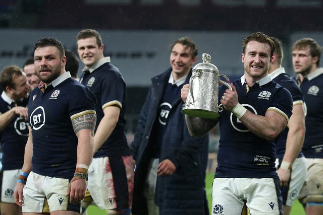Scotland captain Stuart Hogg holds the Calcutta Cup after his side’s victory over England