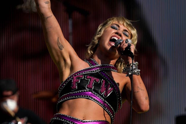 <p>Miley Cyrus performs before the Kansas City Chiefs play the Tampa Bay Buccaneers in Super Bowl LV, Sunday, 7 February 2021</p>