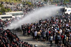 Myanmar police fire water cannon amid largest protests in over a decade