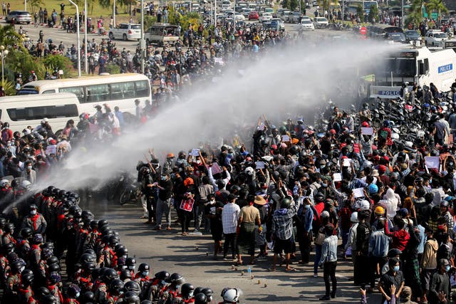 <p>Police used water cannon on protesters demonstrating against the coup and demanding the release of elected leader Aung San Suu Kyi, in Naypyidaw, Myanmar</p>