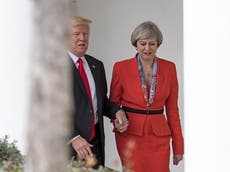 Theresa May called husband to warn him she held hands with Trump, new documentary reveals