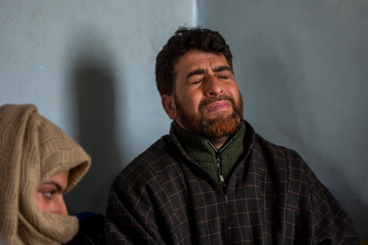 Kashmir man seeking son&rsquo;s body charged under anti-terror law