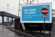 Brexit: Two men charged over anti-Irish Sea border graffiti in port town of Larne