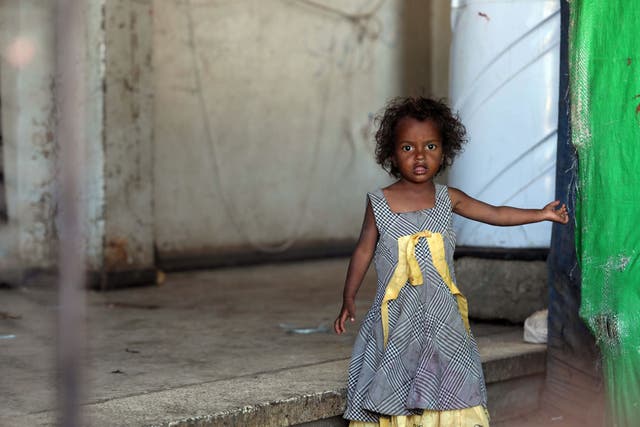 <p>A girl looks on inside a school building for displaced Yemenis who fled fighting between Houthi rebels and the Saudi-backed government forces, in the town of al-Turba, Taiz</p>