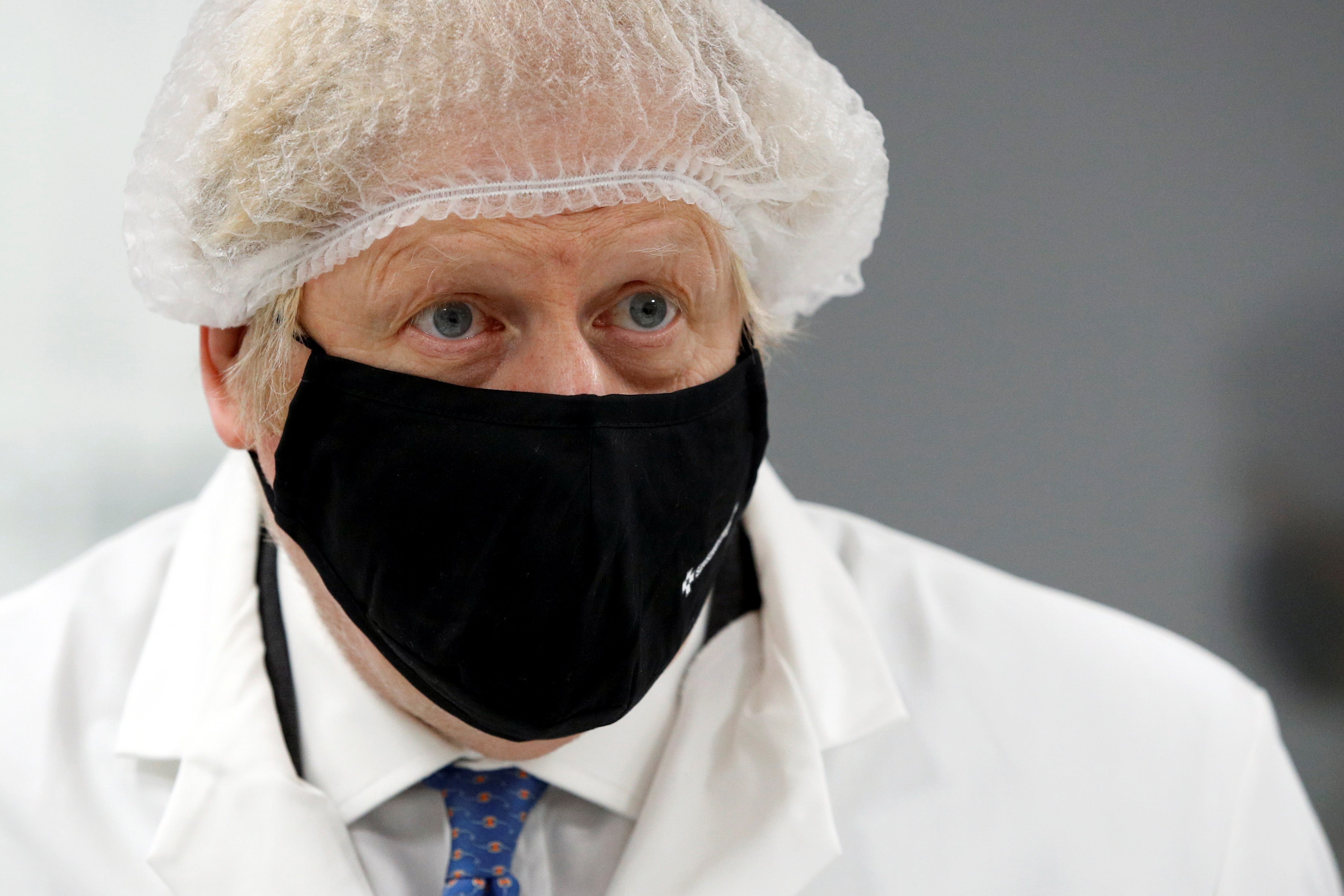 Boris Johnson during a visit to SureScreen Diagnostics on February 7, 2021 in Derby, England