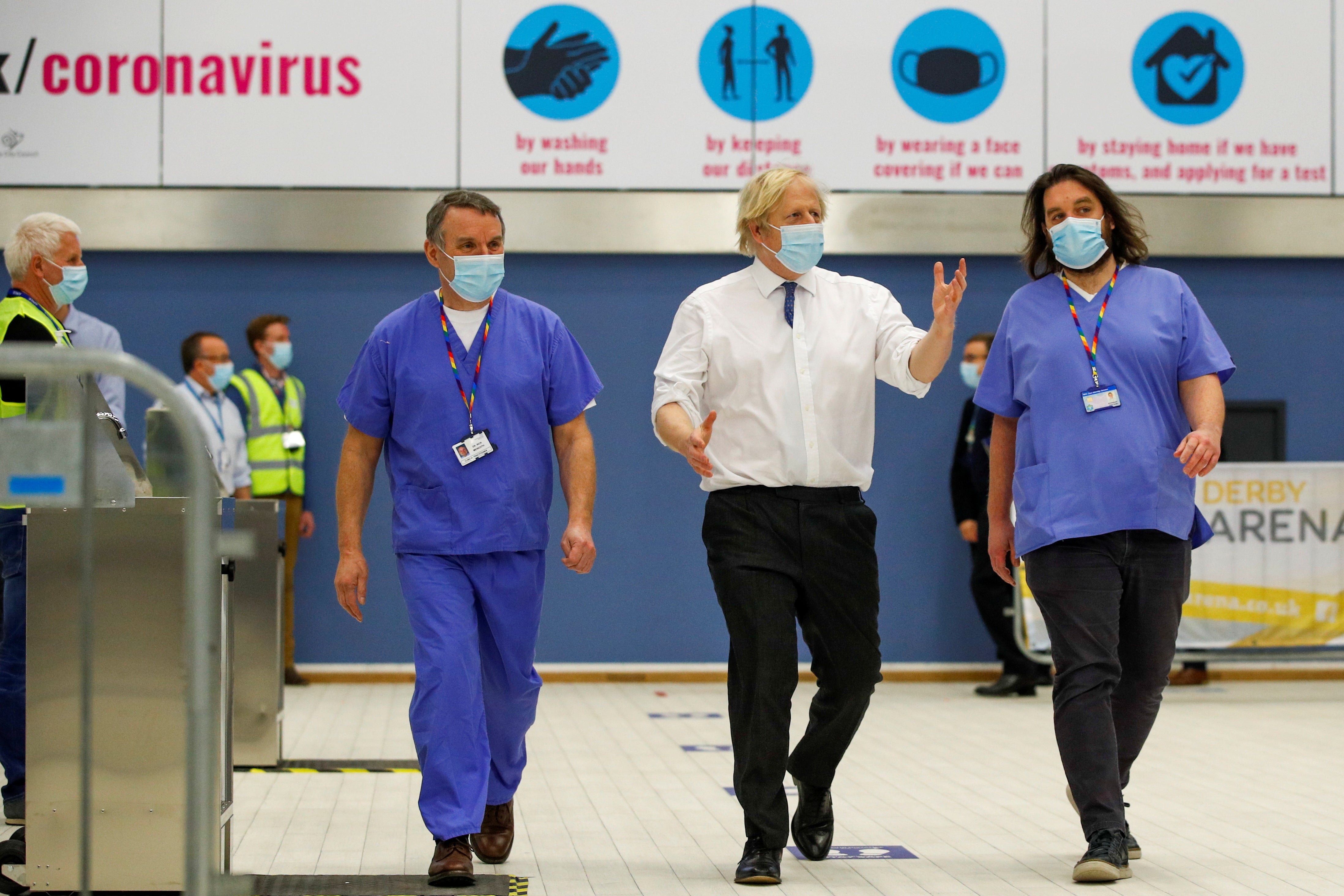 Boris Johnson visits a temporary Covid-19 vaccination centre set up at Derby Arena in Derby