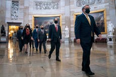 Impeachment trial - live: Senate votes to continue Trump prosecution after graphic Capitol riot video