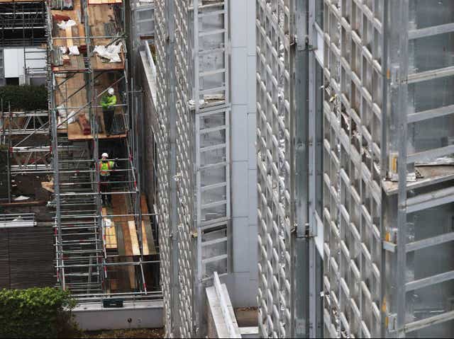 Contractors undertake works at a residential property in Paddington, London, as part of a project to remove and replace non-compliant cladding