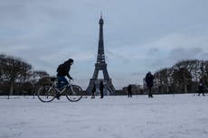 Eiffel Tower needs blowtorch for ice as snow blankets Europe