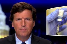 Tucker Carlson says US authorities ‘lying’ about Covid vaccines as conservative media sows doubts over safety